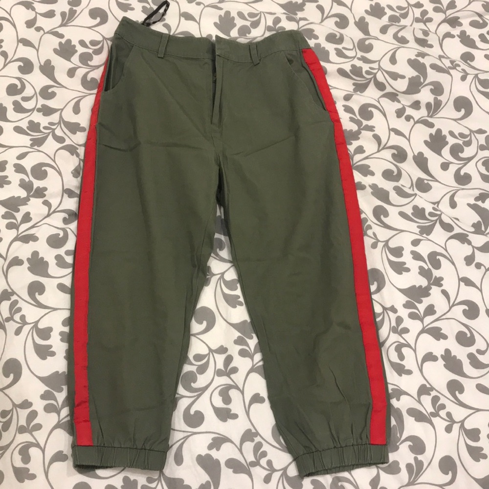 Kaki pants with red stripes